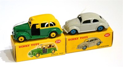 Lot 349 - Dinky 254 Austin Taxi green/yellow (E box G-E) 181 Volkswagen grey (E box G-E) (2)