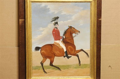 Lot 974 - English School (19th century) Dragoon Officer on Horseback Oil on canvas laid down, 58cm by 46.5cm