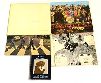 Lot 5 - Beatles Four LPs Revolver, Sgt Pepper, White Album with poster and four portraits and Abbey...