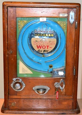 Lot 55 - Wot All Win Amusement Machine wall mounted, with metal spiral to 'Win' slots, fitted with later...