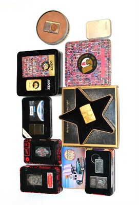 Lot 56 - Zippo Lighters including Hollywoods Leading Light, Chrysler Saratoga, 65th Anniversary, One World 