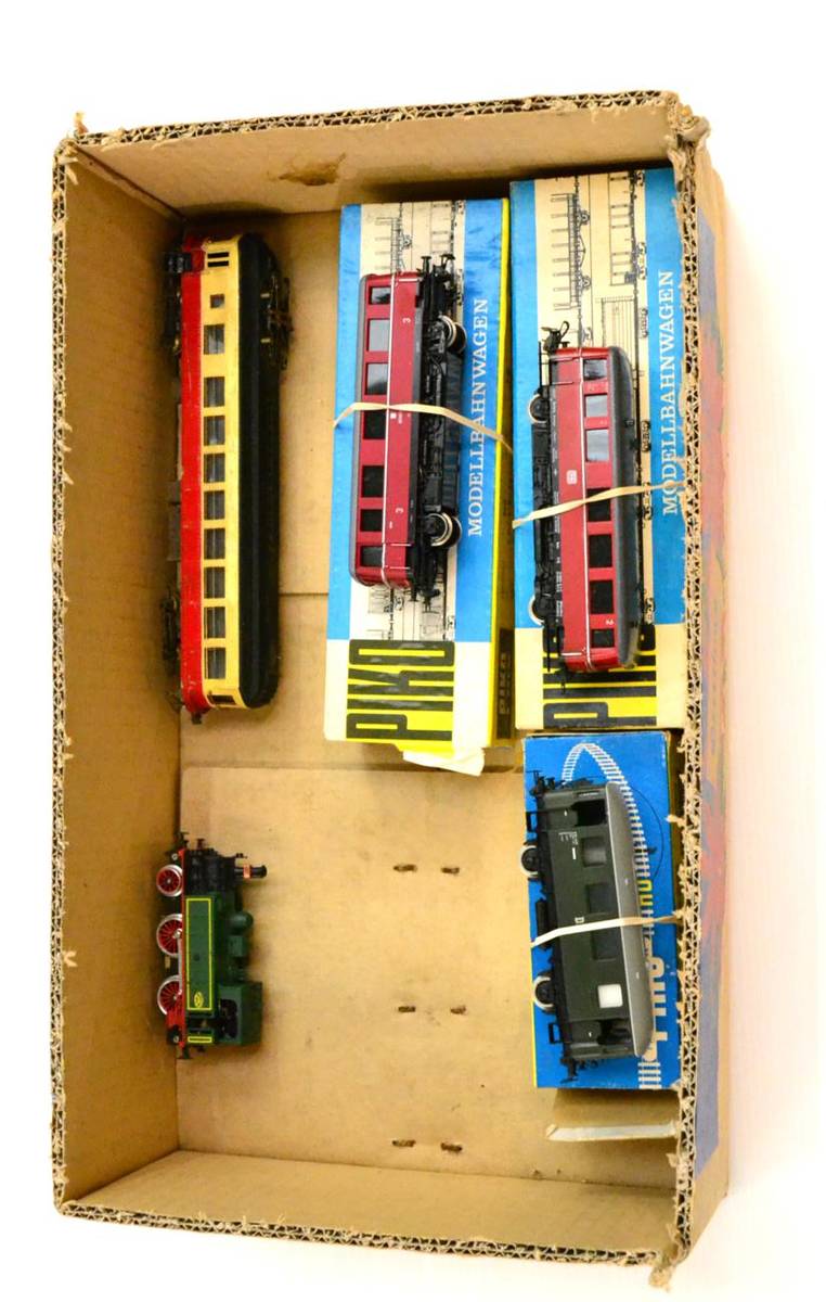 Lot 103 - Brass HO Gauge Pantograph Railcar red/yellow (G) Piko two Railcars and DR Brake van (all boxed) (4)