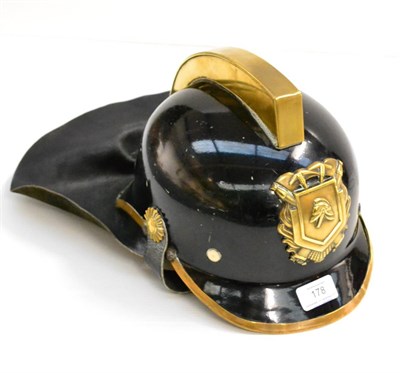 Lot 178 - Amsterdam Fire Brigade Helmet black with comb and crest and leather neck protector