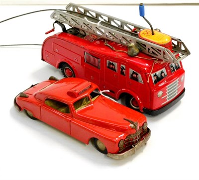 Lot 179 - Arnold 50th Anniversary (1906-1956) Fire Engine with hand wound remote control, lithographed figure