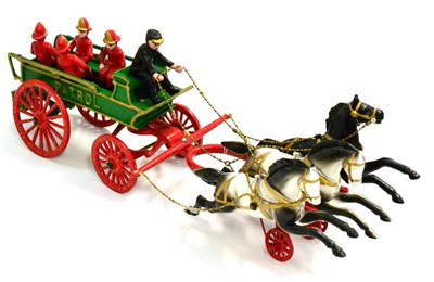 Lot 185 - Carpenter (Reproduction) Cast Iron 1900 Fire Patrol with three horses abreast, five figures...