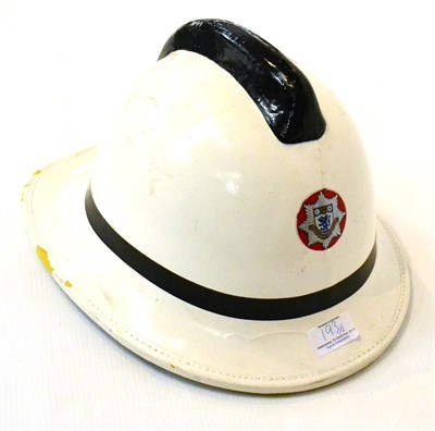 Lot 193 - Cleveland County Fire Brigade Helmet with crest, white, together with a Buckinghamshire Fire &...