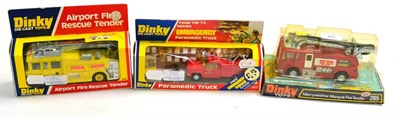 Lot 197 - Dinky Fire Vehicles 267 Paramedic truck 263 Airport Fire Rescue tender (both in window boxes)...