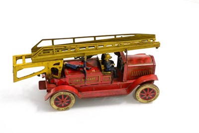 Lot 198 - Distler C/w Fire Engine with five tin figures (one missing), two piece ladder and registration...