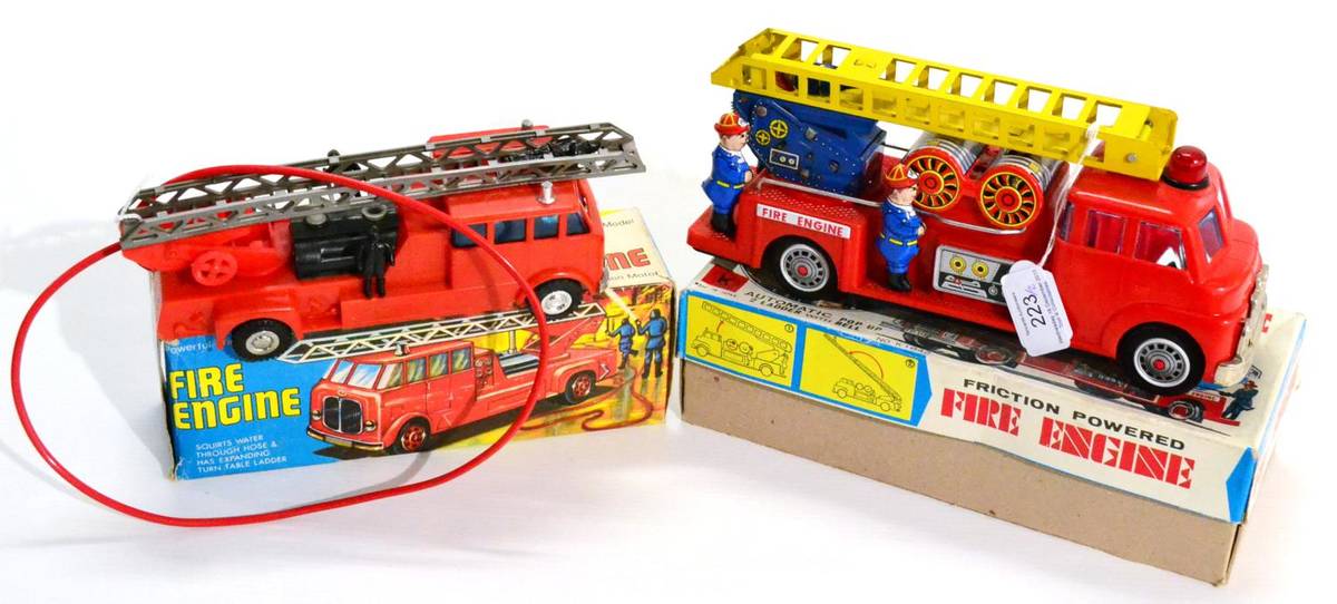 Lot 223 - K (Japan) Friction Fire Engine plastic with raising ladder and five figures 10";, 26cm (E box...