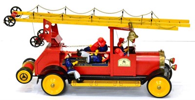 Lot 235 - Nurnberger Blechspielwaren (NBN) Fire Engine with seven composition figures, two piece wooden...