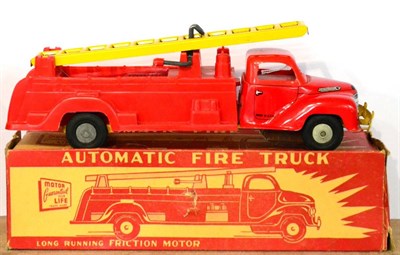 Lot 263 - Walt Reach Automatic Fire Truck friction, with tin cab, plastic back and single piece ladder...