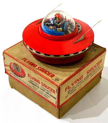 Lot 273 - KO (Japan) Battery Operated Flying Saucer with astronaut figure under acrylic dome 7.5";, 19cm...