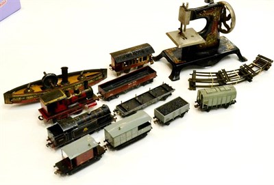 Lot 286 - Early German 25mm Gauge C/w Locomotive And Coach with track circle (6 pieces) (F-G) together with a