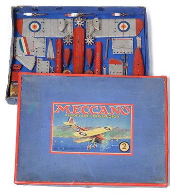 Lot 317 - Meccano No.2 Constructor Aeroplane unmade in silver/red, in original box with non-original...