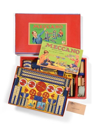 Lot 324 - Meccano Set No.7 with blue hatched/gold pieces with original stringing, in red card box with...