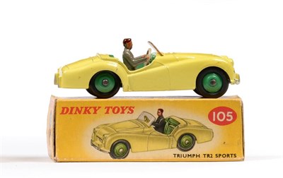 Lot 356 - Dinky 105 Triumph TR2 road version, yellow with green hubs (G-E, some wear mainly to...