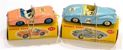 Lot 359 - Dinky 107 Sunbeam Alpine blue (E box E) 111 Triumph TR2 (G-E, decals a little worn, box G-E) (2)