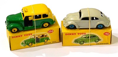 Lot 376 - Dinky 254 Austin Taxi green/yellow (E box G-E) 181 Volkswagen grey (E box G-E) (2)