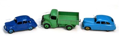 Lot 406 - Dinky Standard Vanguard (E-G) Austin Devon (G, some damage from damp) and Bedford open wagon...