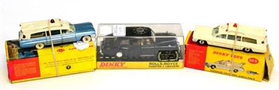 Lot 407 - Dinky Three Boxed Cars 263 Superior Criterion ambulance, white (G), 277 Superior Criterion...