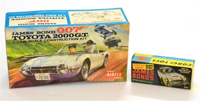 Lot 427 - Corgi 261 James Bond Aston Martin DB5 gold in display box (E box E-G, with leaflet, lapel badge and