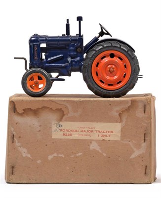 Lot 463 - Chad Valley 9235 Fordson Major Tractor blue, with clockwork motor (overall G-E, one rear wheel...