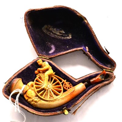Lot 16 - A Meerschaum Pipe or Cheroot Holder in the Form of a Man on a Penny Farthing Bicycle, in...