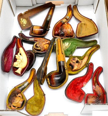 Lot 20 - Eight Cased Meerschaum Pipes, including a figural rams head, a gun dog, lady in hat, naked...