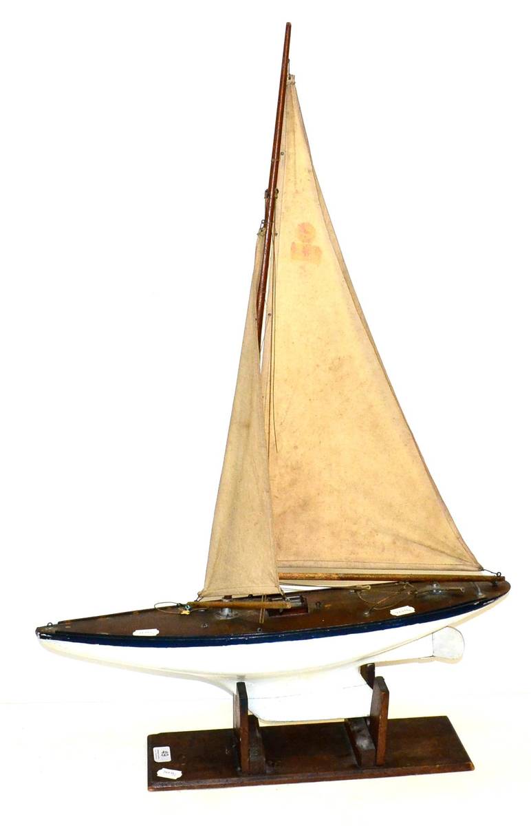 Lot 49 - John Alexander (Preston) Pond Yacht with wooden hull and nicely patinated deck, twin sails on...