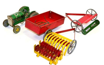 Lot 204 - Mettoy Tractor Set consisting of c/w Tractor (lacking seat) trailer and three other implements (all