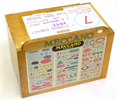 Lot 240 - Meccano Shop Display Cabinet (1956) with six drawers to rear and card parts menu below a wooden...