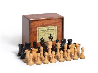 Lot 23 - J Jaques Staunton Chessmen weighted chess set in mahogany box with paper label to lid an brass...