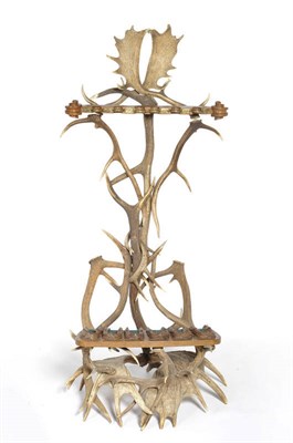 Lot 1081 - A German Antler Mounted Gun Stand, circa 1890, composed of European moose, red and fallow deer...