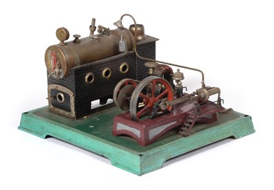 Lot 224 - Doll Live Steam Stationary Engine consisting of horizontal boiler mounted on brick effect base...