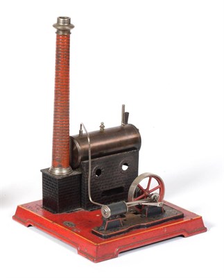 Lot 226 - J Falk Live Steam Stationary Engine consisting of horizontal boiler mounted on brick effect...