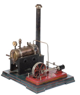 Lot 227 - J Falk Live Steam Stationary Engine consisting of horizontal boiler mounted on brick effect...