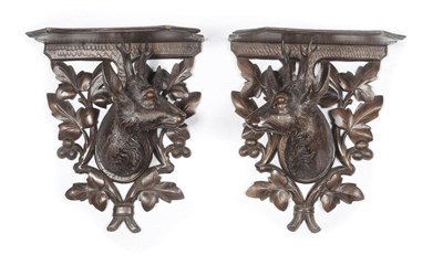 Lot 1091 - A Pair of Swiss Carved and Stained Linden Wood Roe Deer Head Wall Brackets, circa 1900, each...