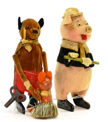 Lot 249 - Schuco (Germany) Two Clockwork Figures (i) Two dancing bears (G) (ii) Pig playing flute (F-G) (2)