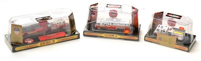 Lot 254 - Code 3 Collectibles Three Fire Vehicles Heavy rescue truck, aerial ladder truck and fire engine...