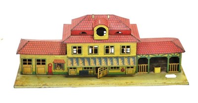 Lot 1113 - Made In Germany O Gauge Through Station brightly lithographed with red roof and various features to