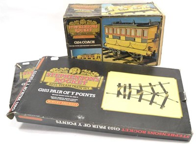 Lot 1114 - Hornby 3.5"; Gauge G104 Stephenson's Rocket Coach (G box F-G) and 2xG103 Y-points (boxed) (3)