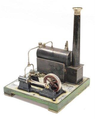 Lot 1126 - Carette Live Steam Engine with horizontal boiler on tin stand with chimney, connected to twin fixed