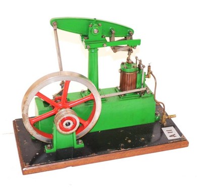 Lot 1156 - Stuart Beam Engine with wood lagged piston and single flywheel 12";, 30cm long