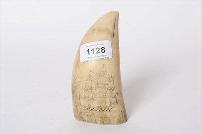 Lot 1128 - A Scrimshaw Sperm Whale Tooth, probably mid 19th century, incised on one side with a biblical scene