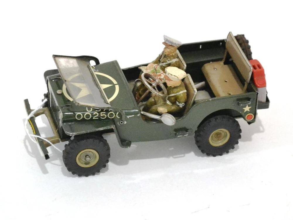 Lot 1168 - Arnold c/w US Military Police Jeep with fold down windscreen, two composition figures (one with...