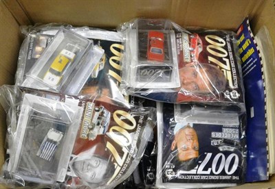 Lot 1192 - James Bond Car Collection a collection of 24 assorted cars with magazines (in original sealed...