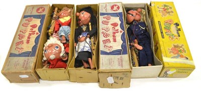 Lot 1273 - Pelham Puppets Policeman and Witch (boxed) and Noddy & Big Ears in unmarked brown card box (4)