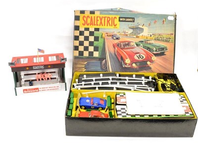 Lot 1276 - Scalextric Set 60 consisting of Aston Martin, red and Ferrari, blue (both E-G, some white...