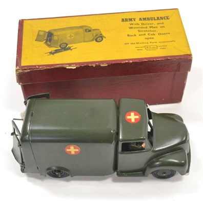 Lot 1293 - Britains 1512 Army Ambulance with casualty on stretcher (E-G, casualty G-F, box G, a little worn)