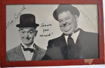 Lot 8 - A Signed Photograph of Stan Laurel and Oliver Hardy, inscribed 'Thank You Willie!', 9cm by...